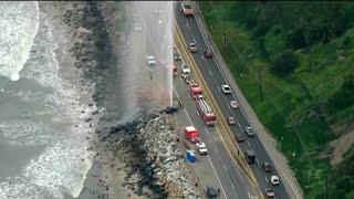Water shoots 400 feet into the air after car crashes into fire hydrant