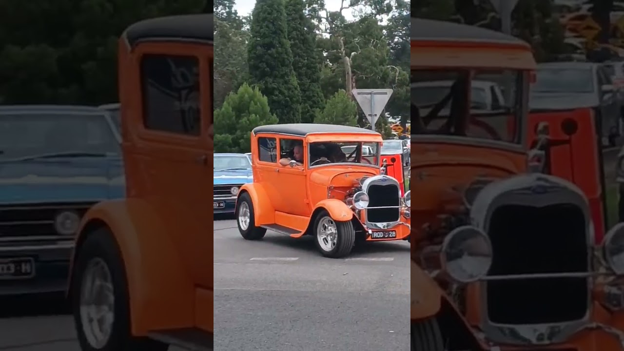 Cars leaving All Ford Day. 