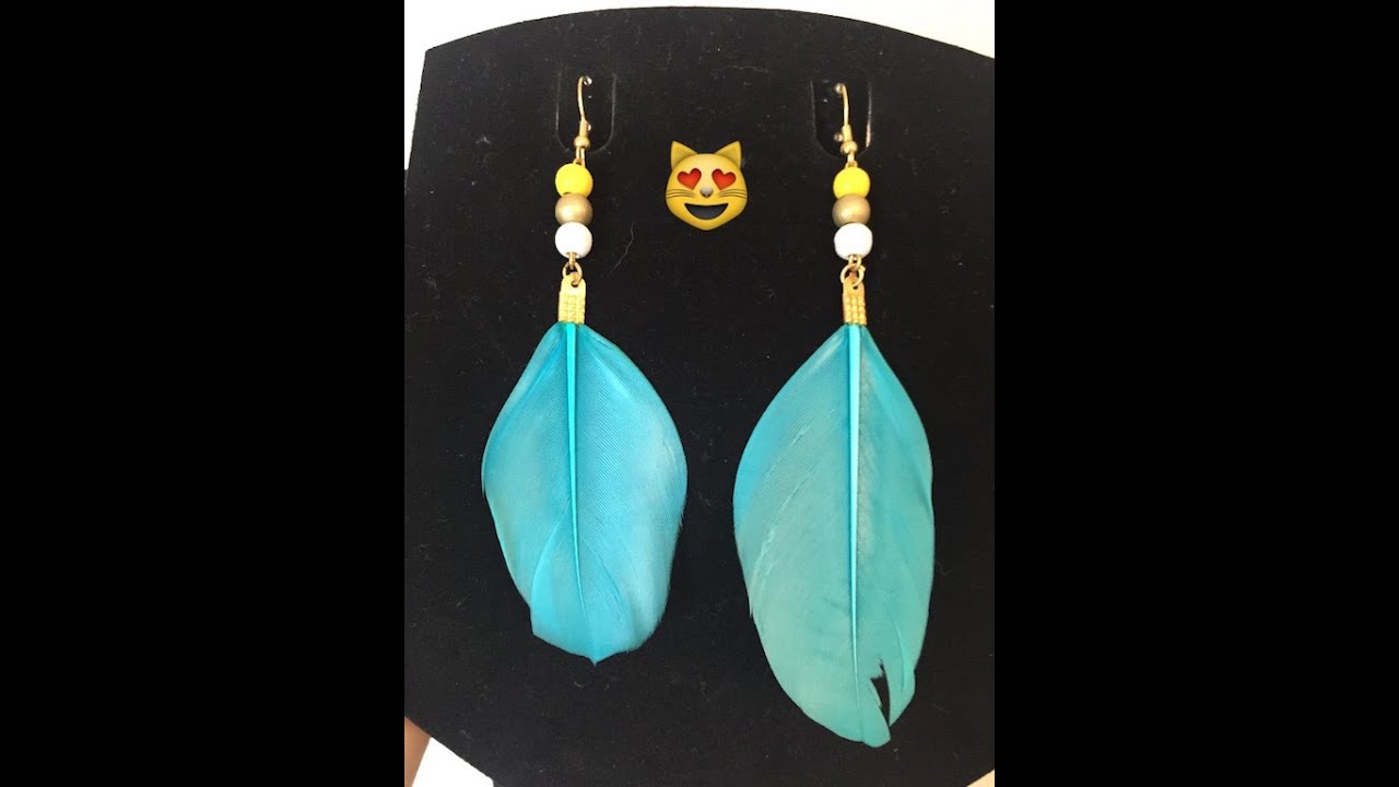 - Boucle d'oreille plume turquoise -
