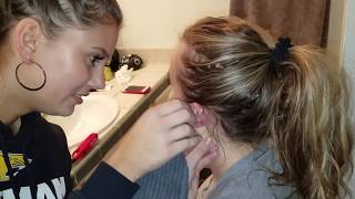 Madi and Nicole Piercing Their Ears At Home