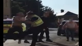 Incredible moment police officer takes down two ‘attackers’ in street as man and woman arrested