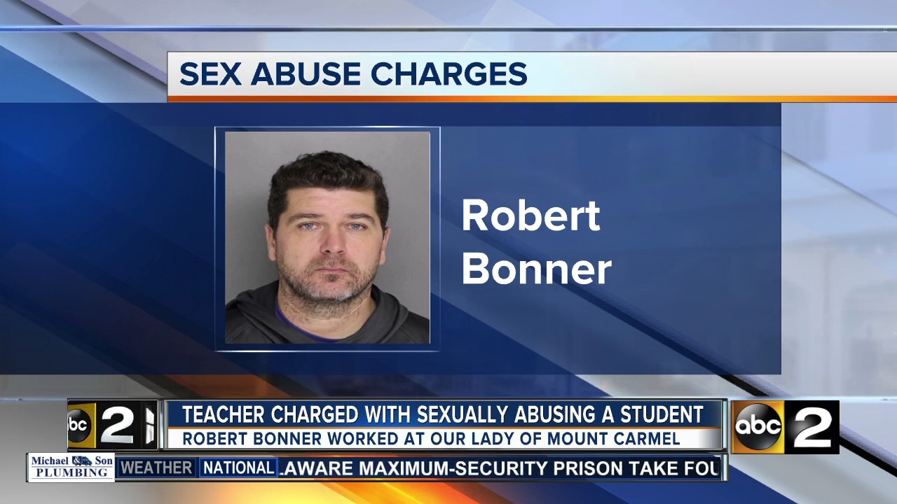Catholic school teacher charged with sex abuse of student - YouTube