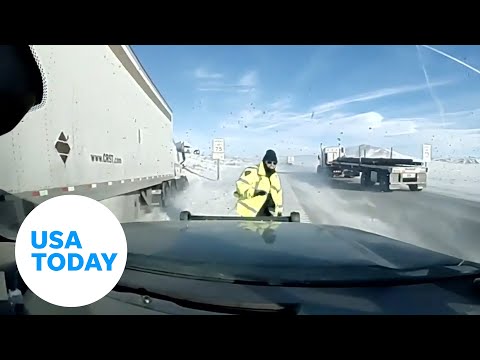 Wyoming highway patrol officer nearly struck by semi-truck | USA TODAY