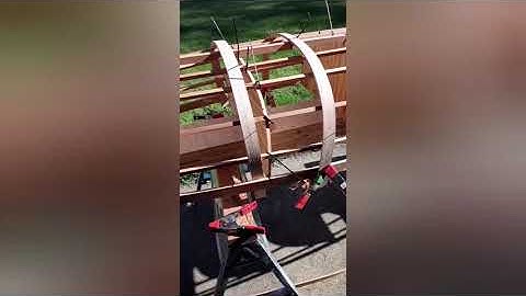 Big Lassie skin on frame canoe.  Video #2.  Steam bending the ribs.