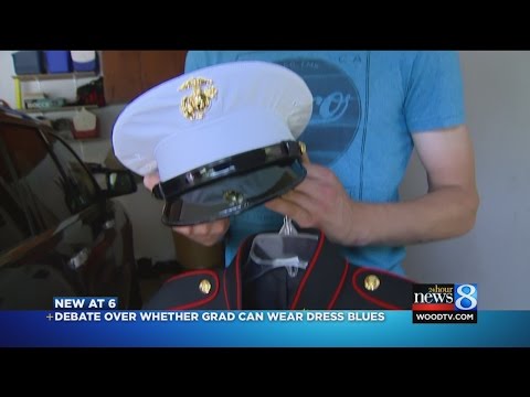 Marine: High school said to change out of uniform before ceremony