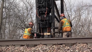 DIESEL PILE DRIVER ACTION on the UNION PACIFIC!! 3 Mixed freights and crossover move. Drone views!