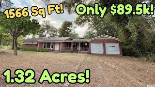 Surrounded by TREES, This 1566 Sq Ft Home is on 1.32 Acres of LAND, and it Has a BARGAIN PRICE!!