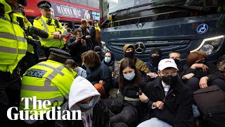 Protesters Block Coach Taking Asylum Seekers To Bibby Stockholm In London