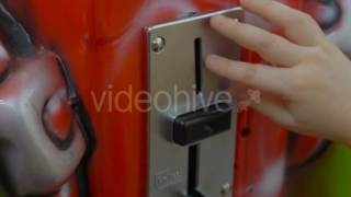 Childs Hand Throws Coin Into a Slot Machine - Stock Footage | VideoHive 15409550 screenshot 3