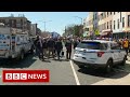 New York Police hunt for man after subway shooting leaves more than 20 injured - BBC News