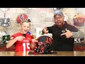 Youth football player makes his own green gridiron helmet