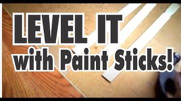 Level a Subfloor for Laminate Flooring with Paint Sticks and Luan Plywood