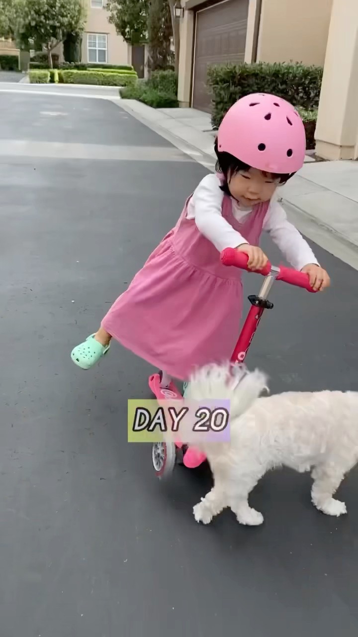 Baby learns how to scooter