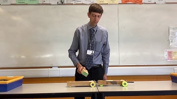 Two identical dynamics trolleys explosion