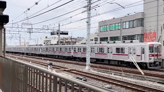 東武10000系11801編成（トップナンバー）が回送電車として草加駅を高速通過するシーン（回6822レ）2024.5.31.16:44