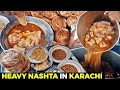 Sunday nashta  paya murgh chanay lacha paratha lahori breakfast in karachi street food pakistan