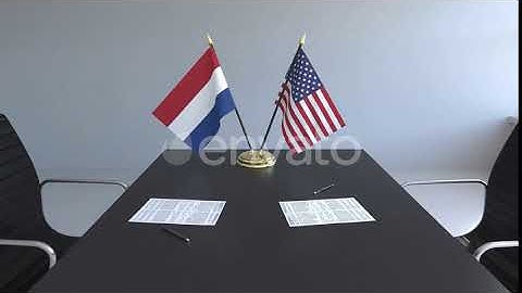 Flags of the Netherlands and the USA on the Table | Motion Graphics - Envato elements