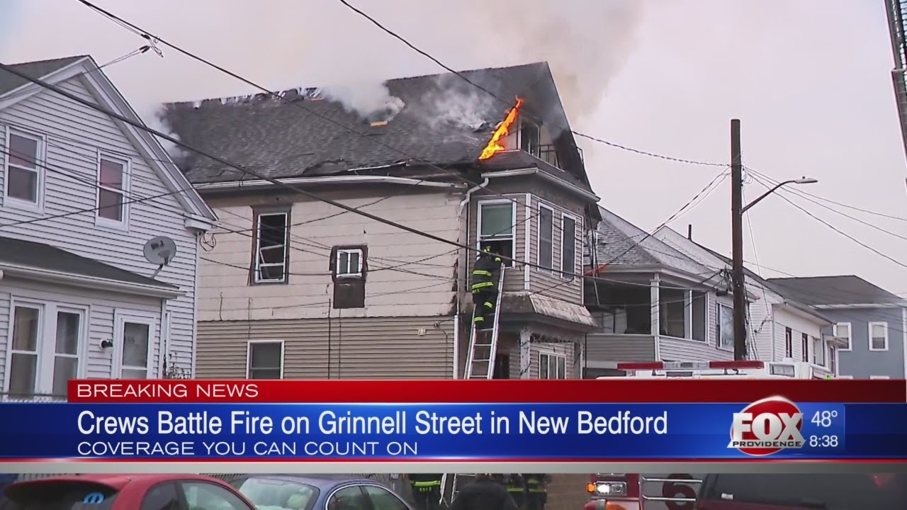 Crews working to extinguish New Bedford house fire - YouTube