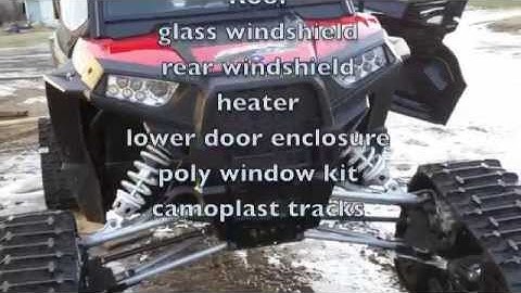 2015 Polaris RZR4 1000 with tracks. Water skipping