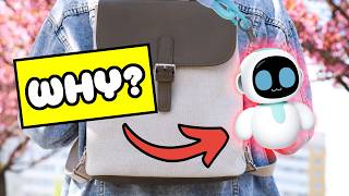 Why Everyone Is Putting This Tiny Robot On Their Bag