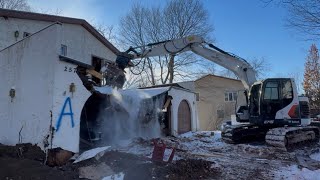 Demolishing a large house in the middle of winter