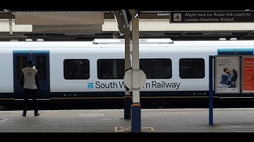 Here is the class 159 And the class 158 in Woking Train station at top speed
