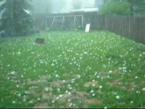 Sorry I was running around like crazy in this vid. I was freaking out....I didn't want my dog to get pummeled in the head with a hail from the window. I didn't expect it at all and it was SO loud. I wish I would of picked up some hail afterwards, but I was too busy assessing all the damage to my house and cars outside. I'll do better next time. :) Videoed in Wisconsin Rapids, WI.