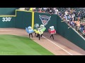 Car Races during a Tigers Baseball Game