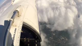 Skydiving with Puffy Clouds