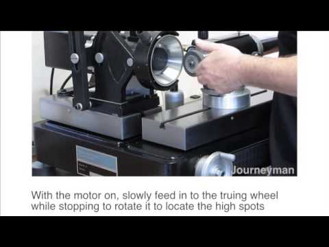 Braked Wheel Truing Device