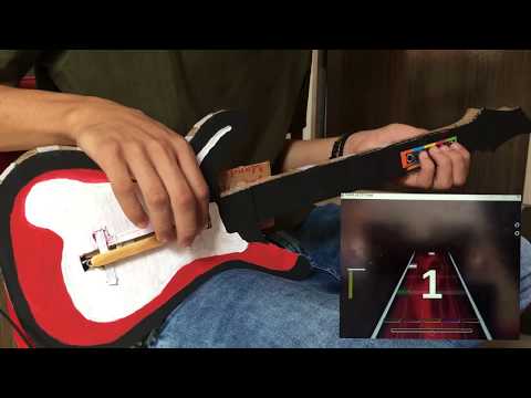 Vídeo: Como fazer uma guitarra de papelão com suas próprias mãos?