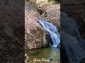 Nature’s Hidden Oasis: The Rhythm of the Falls 🌊🌿✨ #GreenFrame #Shorts #Waterfall