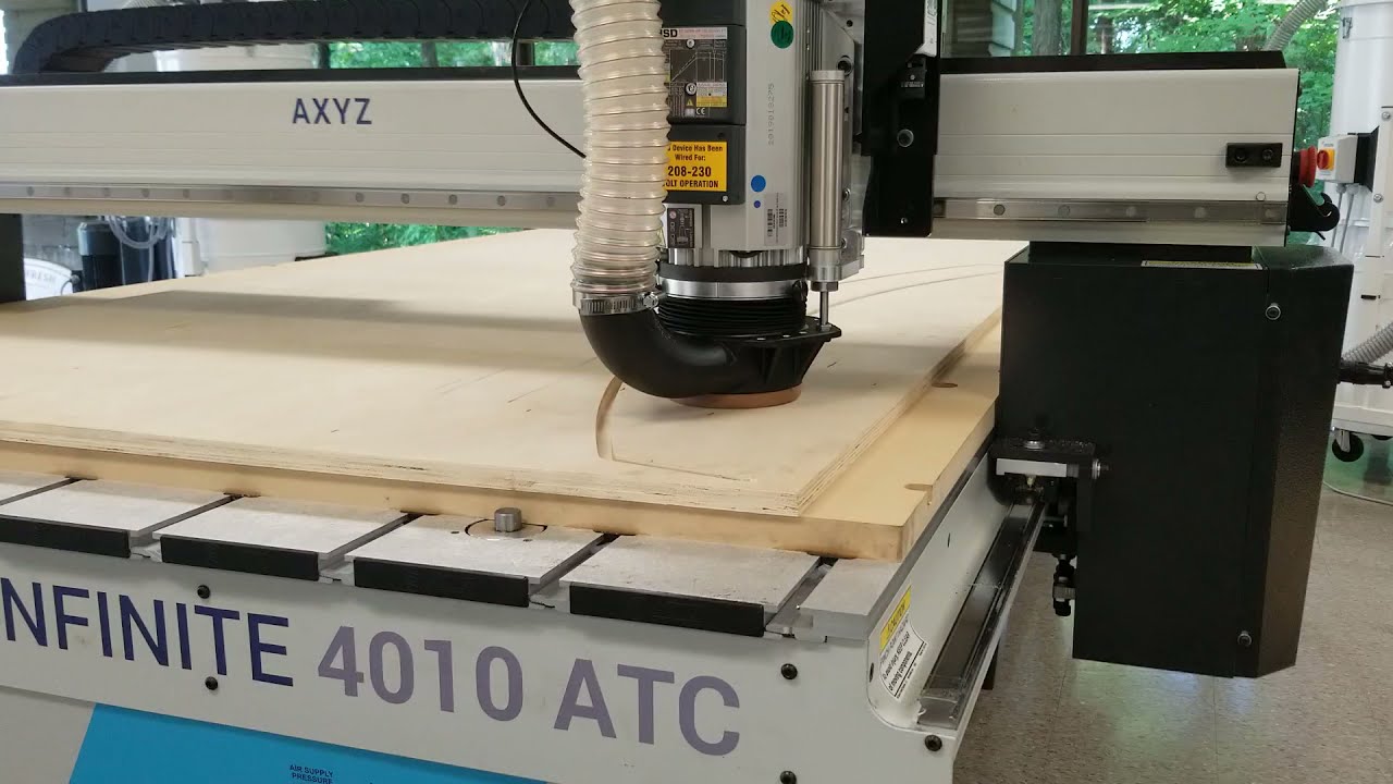 AXYZ Infinite CNC Router cutting 1" birch plywood
