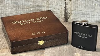 Wooden Groomsman GiftBoxes paired with Black Metal flasks. Perfect for celebrating your special day.