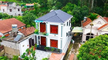 Khám Phá Nhà Mái Nhật 2 Tầng Kết Hợp Với Cửa Thép Vân Gỗ KOFFMANN