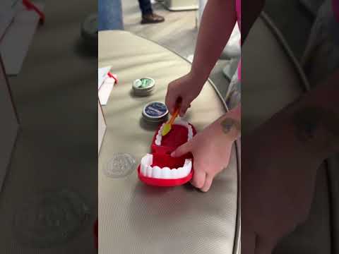 Patient playing with PRE BOX Dentist sensory subscription box
