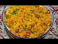 ARROZ CON POLLO Y SALCHICHAS