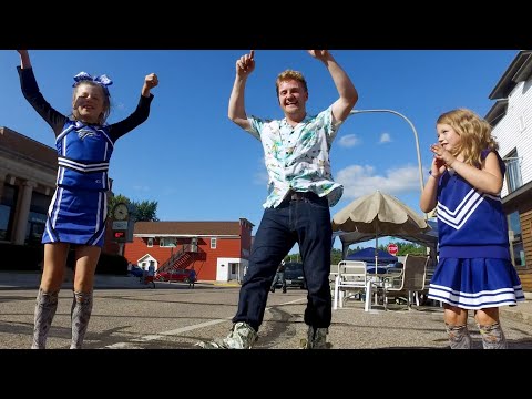 Happy Dave and his cash-covered boots surprise Amherst’s River Fest