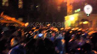 Police beating people protesting currency collapse in Kiev