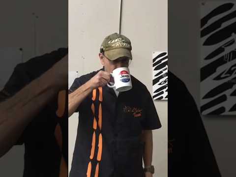 Jeep mug with a Land Rover hat, are you feeling ok?