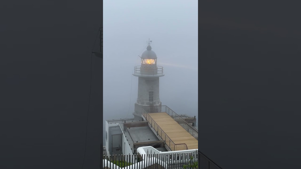 Lighthouse in the fog. Faro de Santa Catalina, Lekeitio, Spain