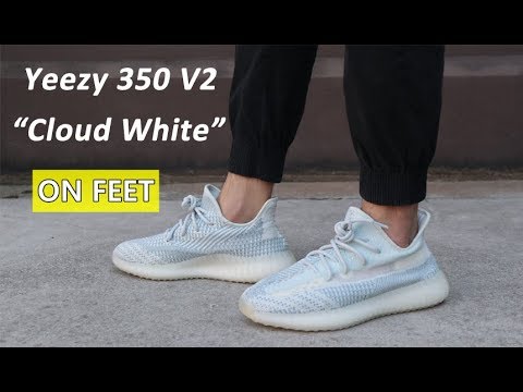 white yeezys on feet