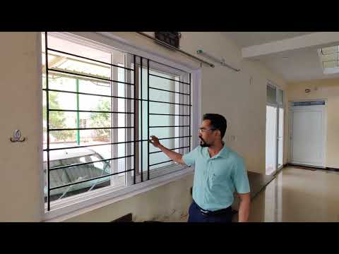 GADLI UPVC SLIDING WINDOW WITH INTEGRATED GRILL AND SS