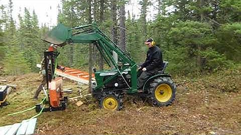 2012 May - Loading the sawmill with the tractor