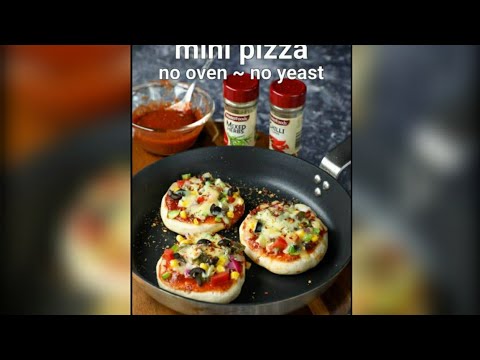 Video: Mini Pizza's Gemaakt Van Oud Brood