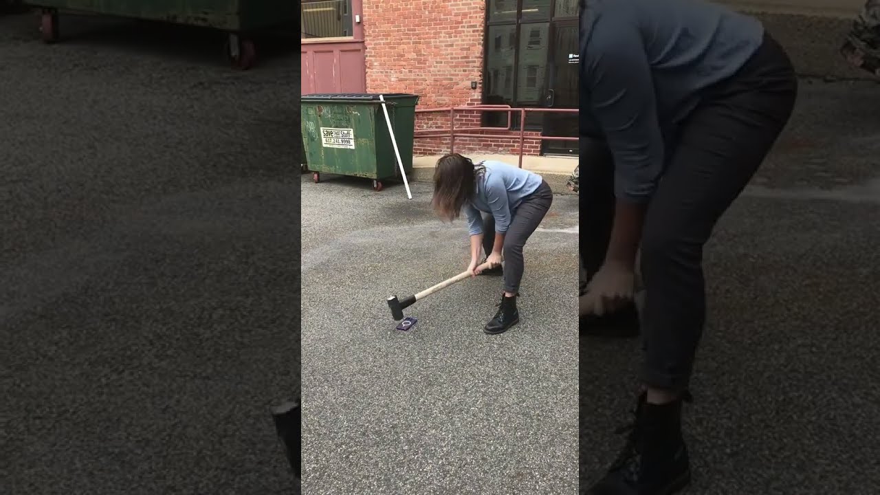Destroying A Phone With Sledgehammer 