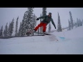 Snowboarding in the mountains of bc big white