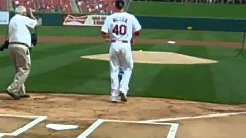 Mike Oltmann throwing the first pitch at the Cardi...