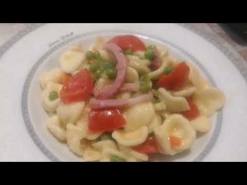 orecchiette con piselli e guanciale