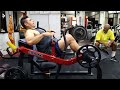 Training glutes with a hip thrust machine